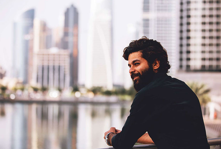 Man looking out over water.