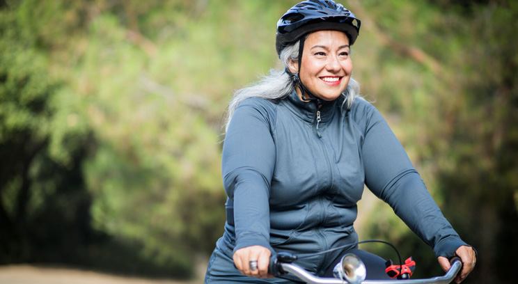 Person smiling while cycling