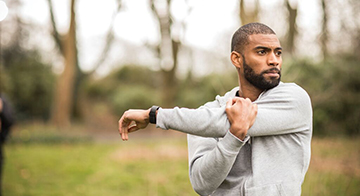 Man stretches in nature